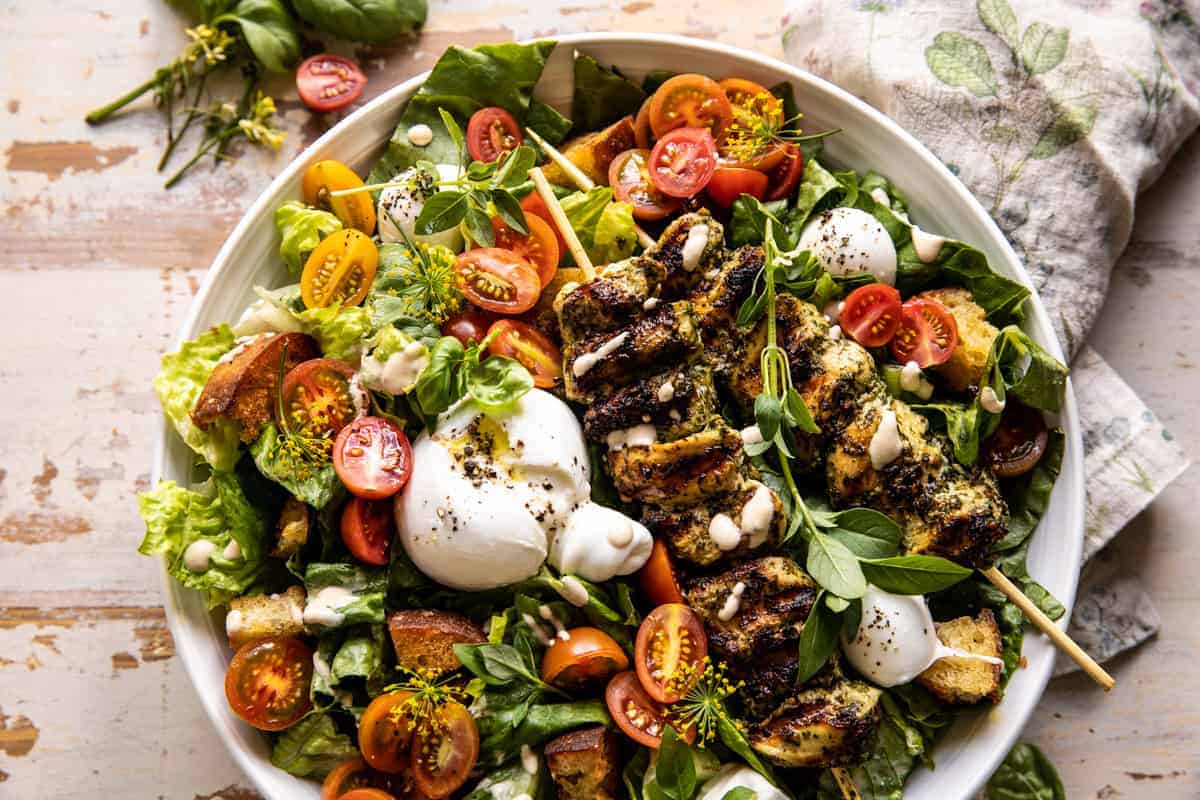 Pesto Chicken Caesar Salad with Tomatoes and Burrata | halfbakedharvest.com